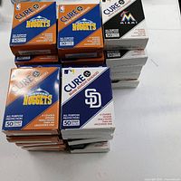 Stacked Cure Nuggets and Marlins bandage boxes