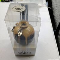 Front view of boxed San Miguel Sandalwood Falls reed diffuser set