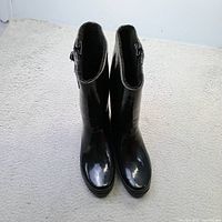 Full view of both rain boots standing upright