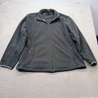Front view of charcoal grey Lands' End fleece jacket showing full-zip, pockets, collar
