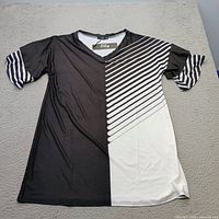 Front view of black and white Lily by Firmiana V-neck top