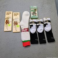 All seven pairs in packaging on surface