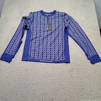 Front view of navy patterned long-sleeve Mountain Horse shirt with tag