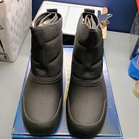 Front view of both boots on box