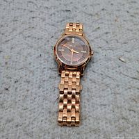 Front view of Relic rose-gold tone women’s wristwatch showing bracelet and dial