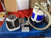 Lot overview with vacuum, scale, cords, hardware