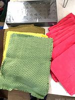 overview of placemats, napkins and sealed shelf