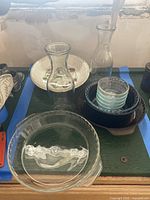 Group shot of carafes, bowls, plate, pie dish