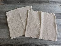 Both pillow covers laid flat showing overall appearance and color