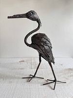 Left side view of welded metal bird figurine