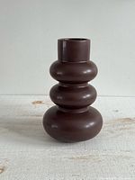Full view of brown stacked oval vase front