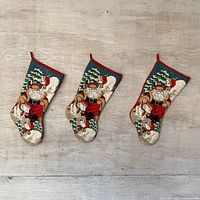 All three matching printed fabric stockings displayed