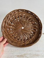 front view of circular woven basket tray