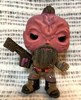 Front view of Taserface Funko Pop showing weapon, outfit and face detail
