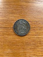 Reverse showing crowned lion atop shield with denomination and date 1929
