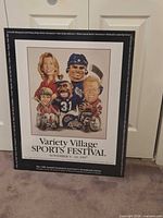 Front view of framed poster showing artwork and text