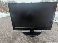 Front view of LG 32-inch TV on stand