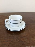 Cup on saucer, three-quarter view