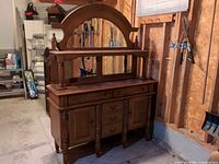 Front view of sideboard buffet with mirror hutch