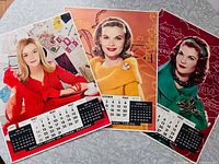 Group shot of all three Timken calendar posters