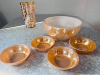 Group shot of all six glass items on table