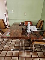 Angle view of full table showing arborite top and chrome legs