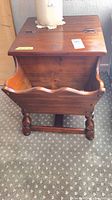 Full view of dough box end table showing lid, magazine rack and legs