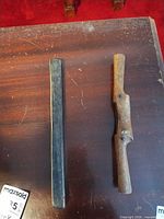 Top view of both wooden tools on table