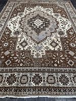 Full view of rug showing pattern and condition