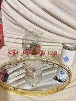 Group shot of entire lot showing tray, glasses, jar with marbles, heart box, pitcher