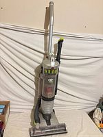 Full view of Hoover upright vacuum standing