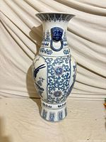 Full view of vase showing shape, decoration, and handles