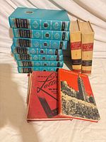 Group shot of all 11 hardcover books