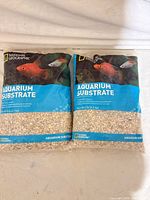 Front view showing two sealed substrate bags with branding and weight