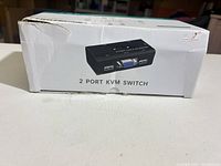 Front of retail box showing image of the KVM switch and product name