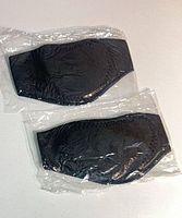 Two black arm trimmer wraps sealed in plastic