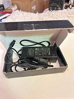 Charger and cables inside box