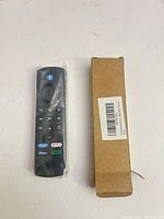 Front view of sealed Alexa Voice Remote with box
