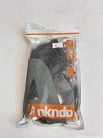 Front of sealed Ankndo pouch showing braided cables inside