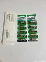 Front view of two 5-packs and opened white sleeve packaging