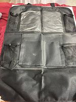 full view of organizer front showing pockets and kick mat