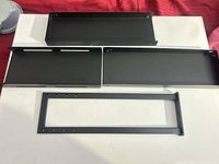 rack mount frame and three shelf panels laid out