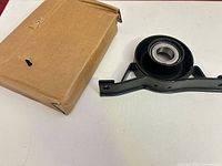 Bearing assembly beside plain cardboard box