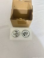 Two chrome mirrored reflector bulbs in foam insert with box