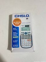 Front of sealed calculator box showing model and features
