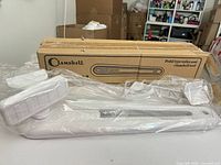 Boxed Clamshell pedal toilet seat opener with packaging