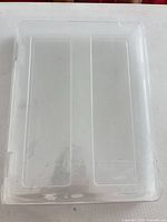 Top view of clear plastic storage container in original wrap
