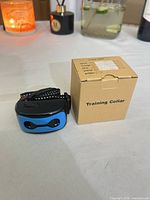 Receiver attached to strap next to product box