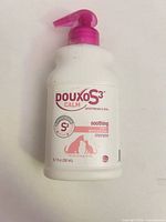 Front view of sealed Douxo S3 Calm shampoo bottle