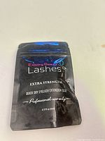 Front of sealed foil pouch showing brand, product name, volume